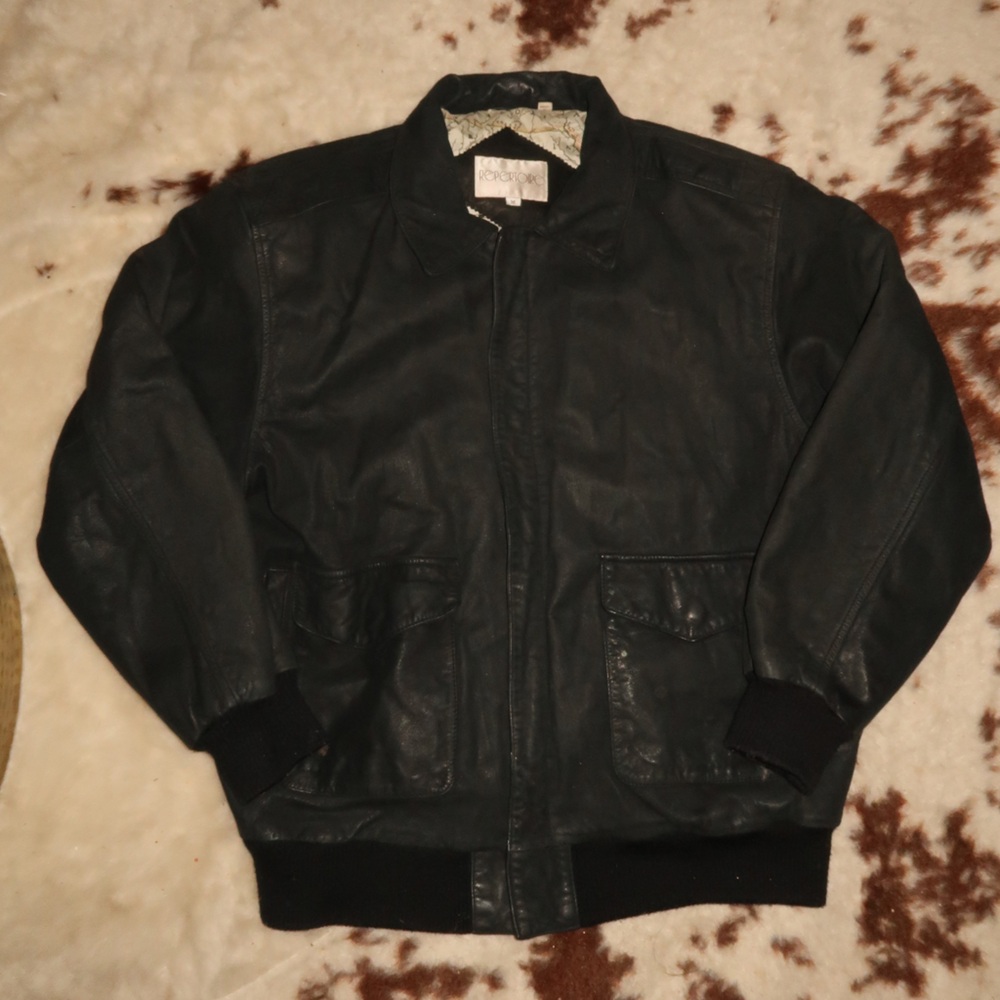 Black leather vintage jacket with map lining